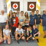 Aktionstag Schulsanitätsdienst - üben und trainieren wie die Profis im Rettcampus in Bayreuth - Gruppenfoto der Teilnehmden und Dozenten.