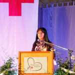 Sybille Pichl, , zweite stellvertretende Vorsitzende des BRK-Kreisverbandes Bayreuth, betonte bei der Weihe-Veranstaltung des neuen BRK-Herzenswunsch-Hospizmobils die Wichtigkeit und Auswirkung des Ehrenamtes des Roten Kreuzes.